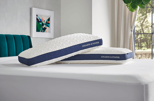 2 Reserve Memory Foam pillows stacked on a bed