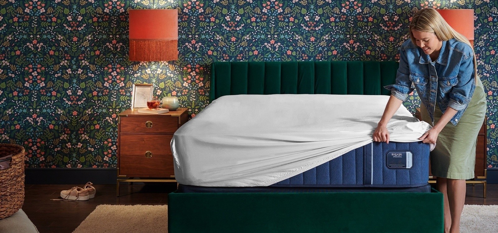 Woman putting Sheet Set On A Estate Mattress